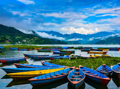 colorful boats in Phewa Lake Nepal